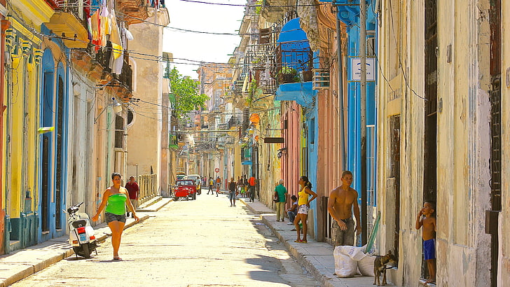 women's green strap top, Havana, Cuba, architecture, building exterior