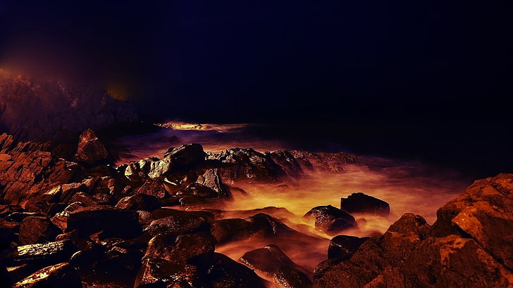brown rock formation, landscape, night, artificial lights, outdoors