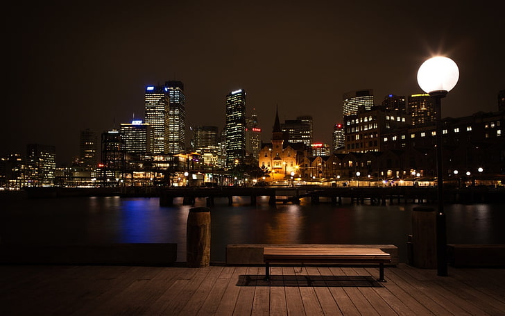 brown wooden bench, cityscape, urban, night, illuminated, architecture