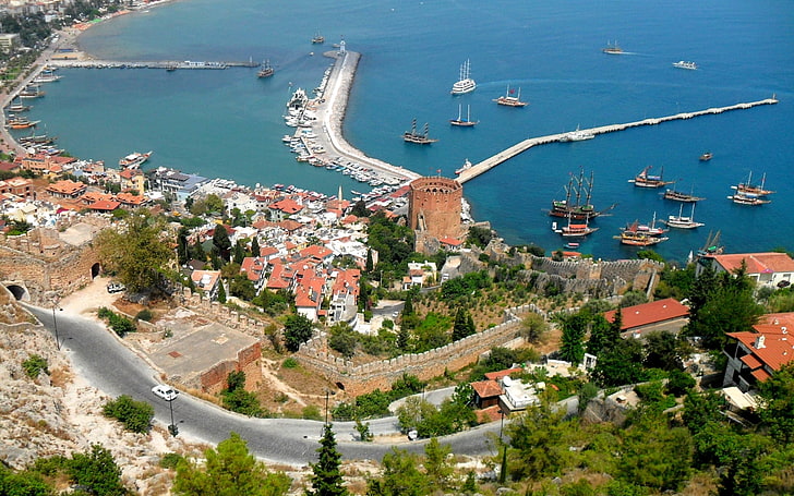 aerial photo of city near body of water, turkey, alanya, mountain
