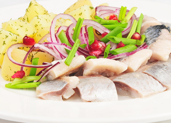 sliced fish meat with sliced onion dish, potatoes, onions, herring