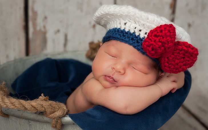 Newborn Baby In Sailor Girl Hat, toddler's white and blue knit hat