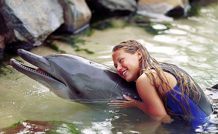 anna kournikova dolphins 1665x1024  Animals Dolphins HD Art