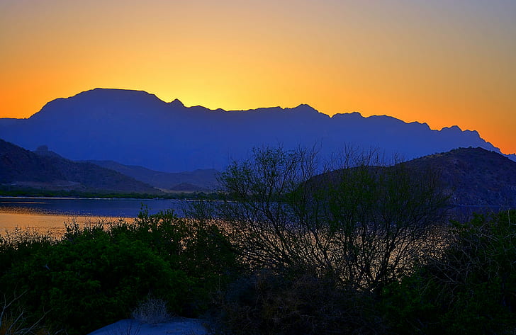landscape photography of mountains and lake during golden hour, orange, orange