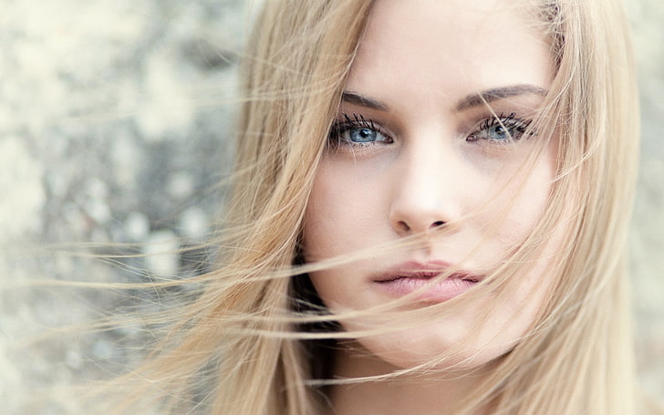 woman face, blonde, hair in face, portrait, model, blue eyes