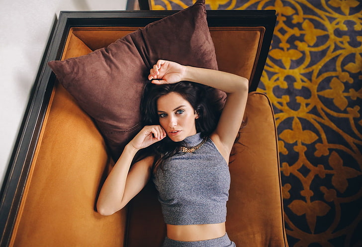 women's grey crop top, Aurela Skandaj, model, couch, portrait