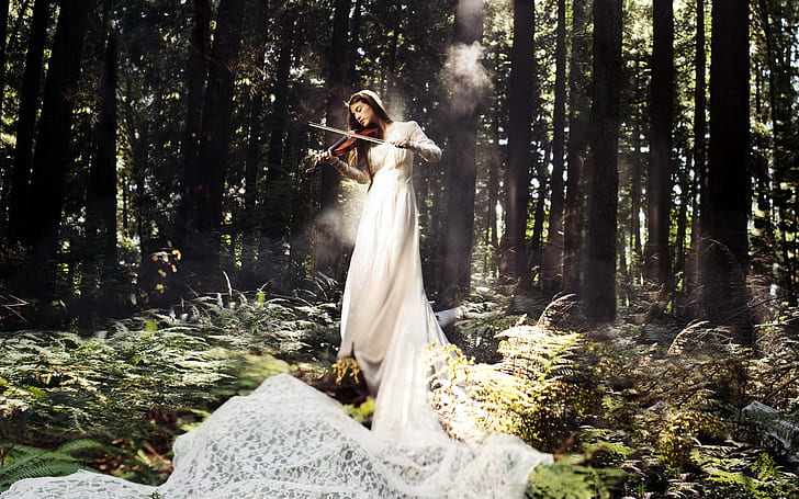 White dress music girl, play violin in the forest