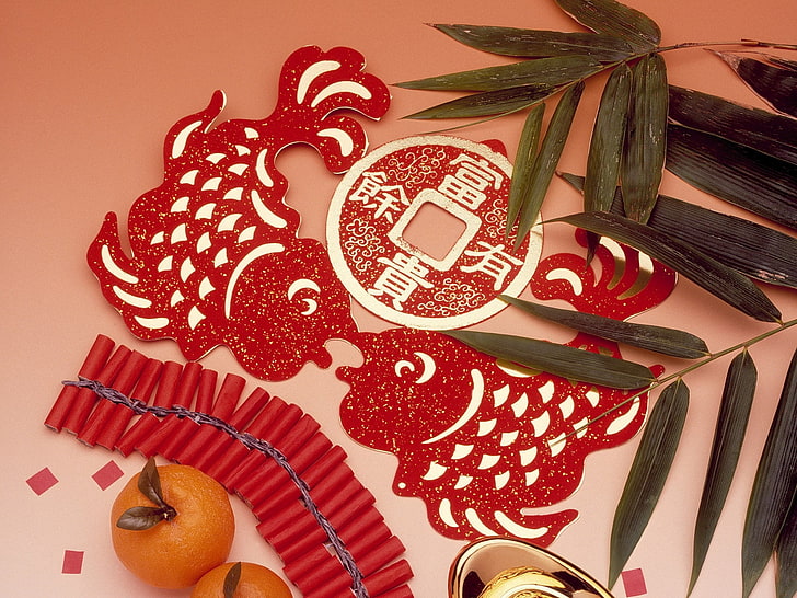 red fireworks and feng shui decor, tangerines, coins, figurines