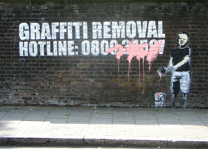 brown brick wall with text overlay, Artistic, Graffiti, Banksy
