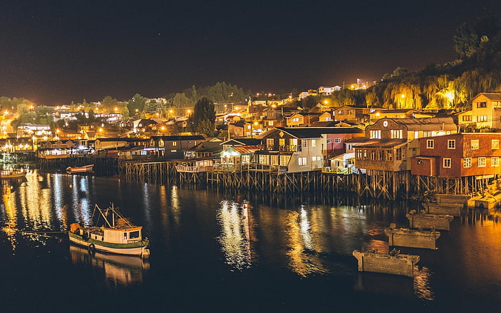 white tug boat, night, lights, city, pile-dwelling, Chile, island