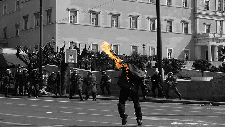 red and yellow fire, riots, police, Molotov, selective coloring