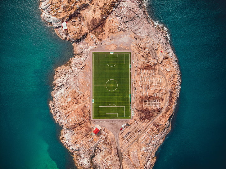 aerial photography of soccer field, football field, island, top view