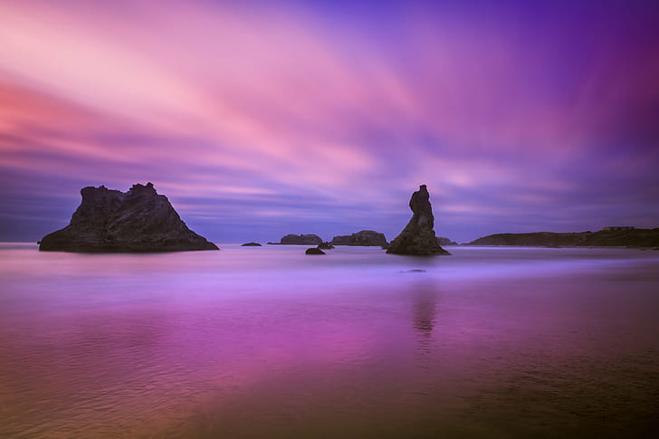 rock formation surrounded with body of water under blue and pink sky, oregon, oregon