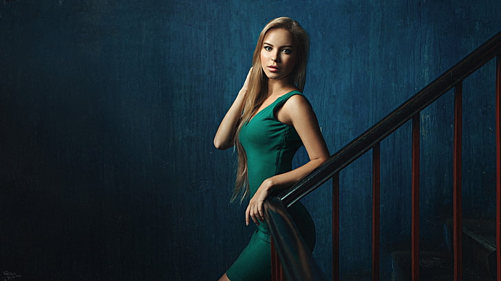 women's green sleeveless dress, blonde, wall, portrait, stairs