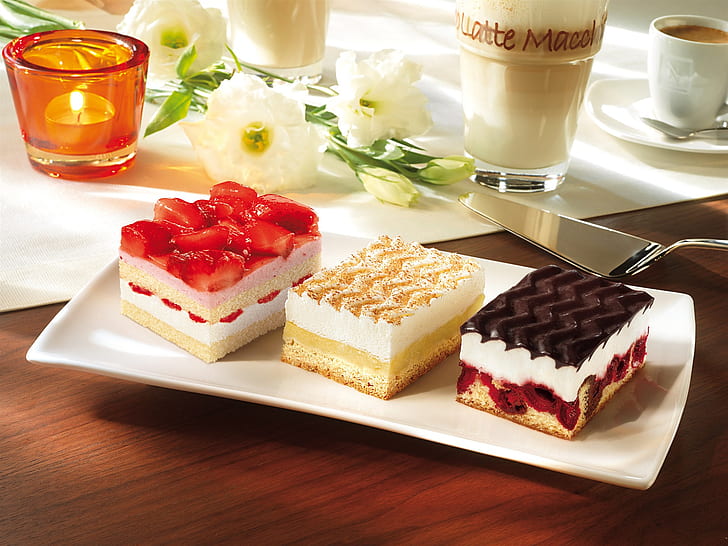 Three different cakes, strawberries, cream, chocolate, dessert