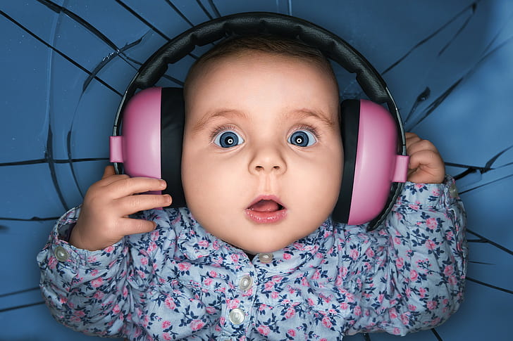 Child with headphones, delight, funny