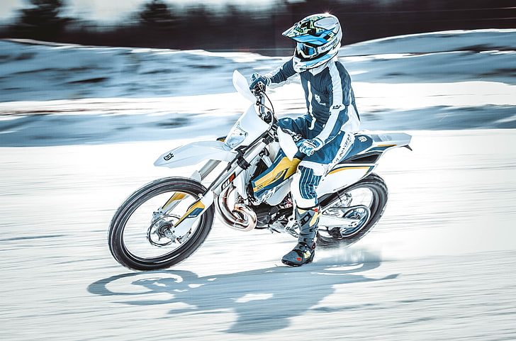white and blue motocross dirt bike, motorcyclist, speed, snow