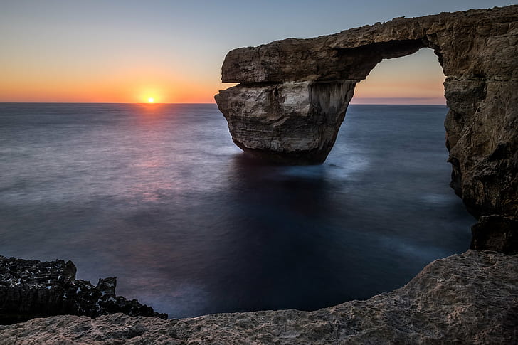 landscape photography of rock surrounded by bodies of water, san lawrenz, malta, san lawrenz, malta